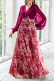 FJØRNA floral print V-neck balloon sleeve maxi dress, perfect for wedding guests, with a flowy silhouette and vibrant floral pattern.