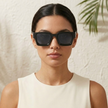 FJØRNA vintage rectangular unisex sunglasses with dark lenses and tortoiseshell frames, stylish accessories for women and men.