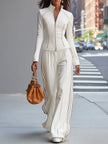 White FJØRNA stand collar zip-up wide-leg trouser suit, featuring a stylish pants set with a modern, tailored design.