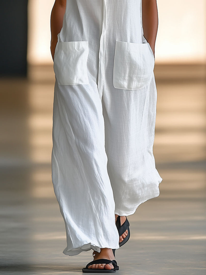 White linen sleeveless wide-leg jumpsuit for women by FJØRNA, featuring a relaxed fit and elegant, breathable fabric.