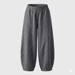 FJØRNA women's high waist cotton linen trousers with relaxed fit, showcasing the lightweight fabric and stylish tailored design.