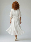 FJØRNA women's summer midi dress, lightweight and flowy, with a relaxed fit and breezy fabric perfect for warm weather.