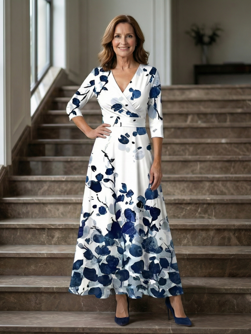 FJØRNA women's summer maxi dress with floral pattern, long sleeves, wrap style, flowy fit, perfect for warm weather.