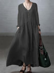 FJØRNA casual cotton and linen V-neck dress, loose fit, perfect for weddings or relaxed occasions, shown in natural fabric and style.