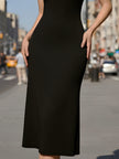 FJØRNA black halter midi dress with contrast white Peter Pan collar, sleeveless design, elegant and stylish for occasions