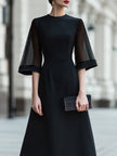 FJØRNA sheer sleeve midi dress with structured waist, elegant design, and lightweight fabric, perfect for stylish occasions.