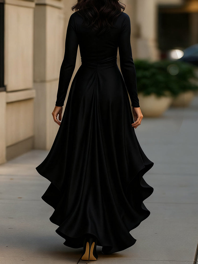 FJØRNA midnight blue satin maxi dress with draped fabric and ruffle details, elegant evening dress with flowy silhouette.