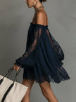 FJØRNA elegant mini dress for women featuring off-shoulder design and pleated details, perfect for stylish occasions.