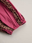 Rose red leopard print chiffon jumpsuit with long sleeves by FJØRNA, featuring a flowing fabric and stylish fit.