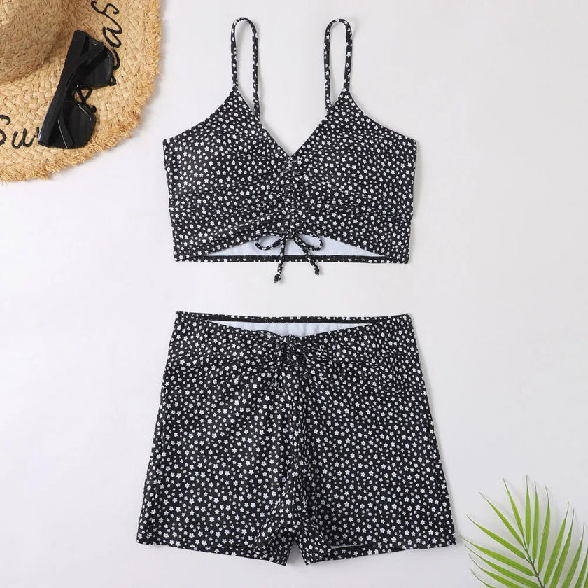 Women's printed FJØRNA tankini set with flattering fit, featuring colorful patterned swimwear top and bottom for summer swimming.