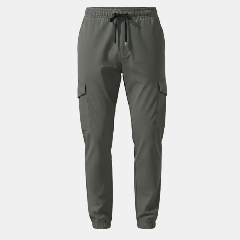 FJØRNA men's cargo trousers with drawstring waist, relaxed fit, featuring multiple pockets and casual style.