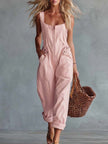 Light yellow denim jumpsuit with square neckline and zip-front closure, styled by FJØRNA, shown on a model.