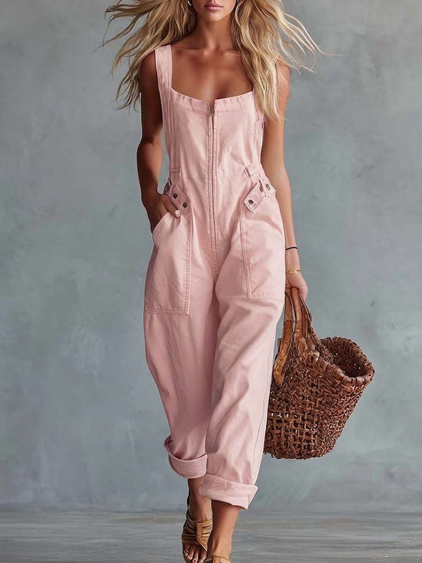 Light yellow denim jumpsuit with square neckline and zip-front closure, styled by FJØRNA, shown on a model.