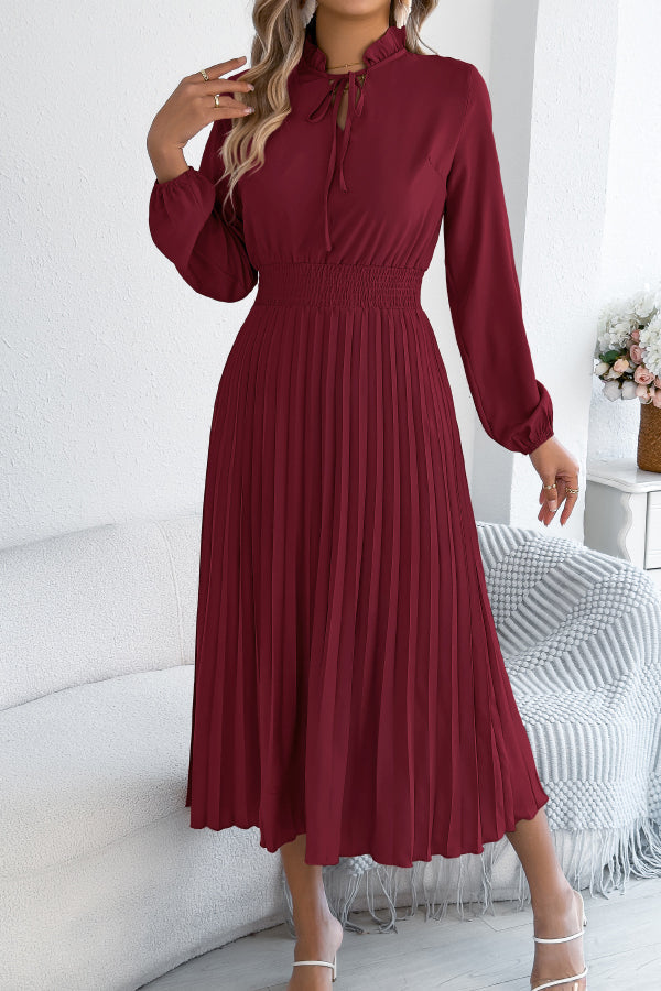FJØRNA solid color long-sleeved fitted waist pleated midi dress, elegant and tailored for sophisticated style.