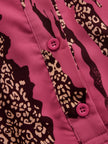 FJØRNA rose red leopard print chiffon long sleeve jumpsuit displayed on a model with flowing fabric and stylish design.