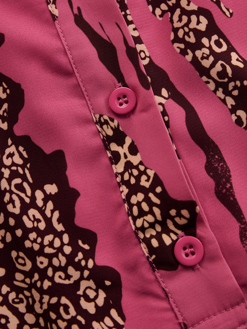 FJØRNA rose red leopard print chiffon long sleeve jumpsuit displayed on a model with flowing fabric and stylish design.