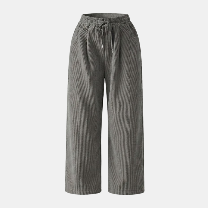 FJØRNA men's corduroy wide-leg trousers in relaxed fit, showing beige textured fabric and stylish relaxed silhouette.