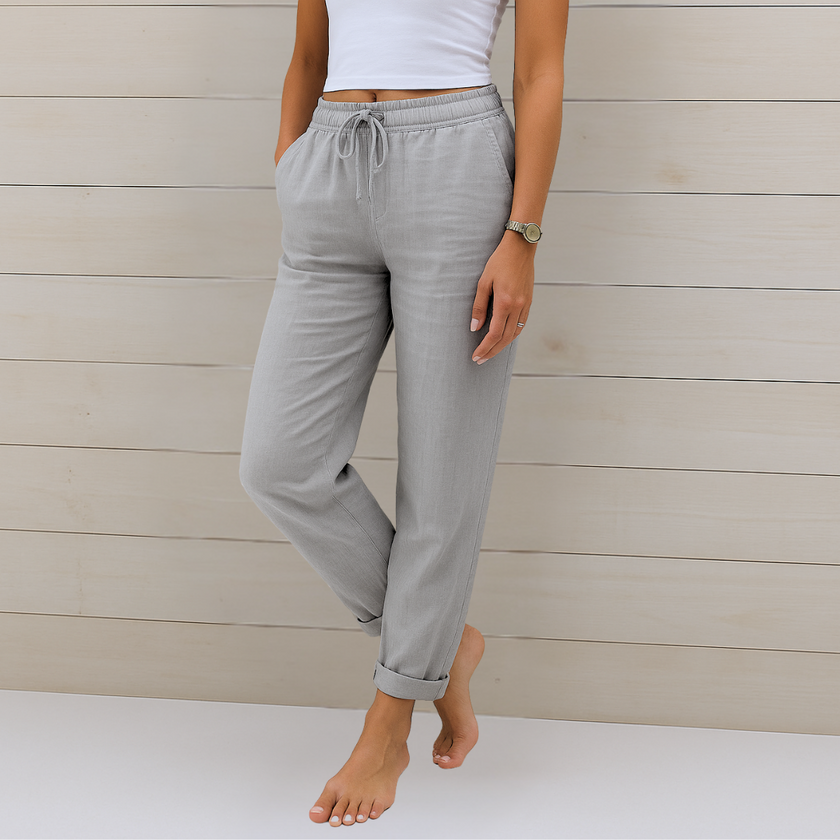 FJØRNA Lori™ premium breathable pants with elastic waistband, soft fabric and comfortable fit, shown in a relaxed pose.