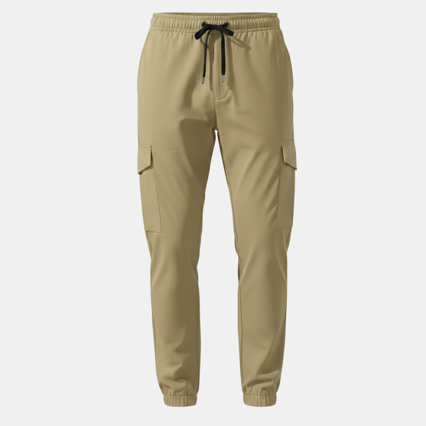 FJØRNA men's cargo trousers with drawstring waist and relaxed fit, shown in a casual style with multiple pockets.
