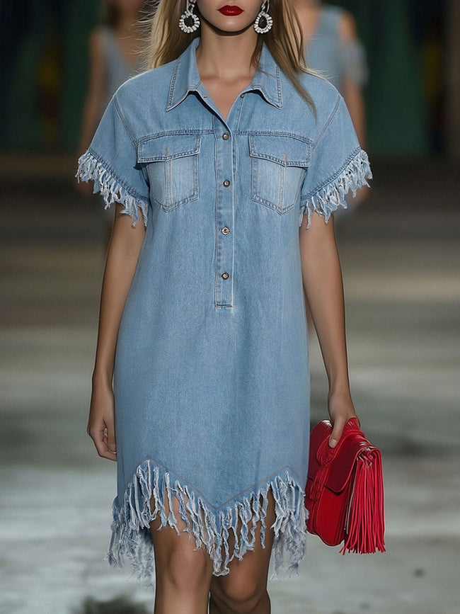 FJØRNA denim tassel mini dress with casual style, featuring a sleeveless design and tassel details on the hem.