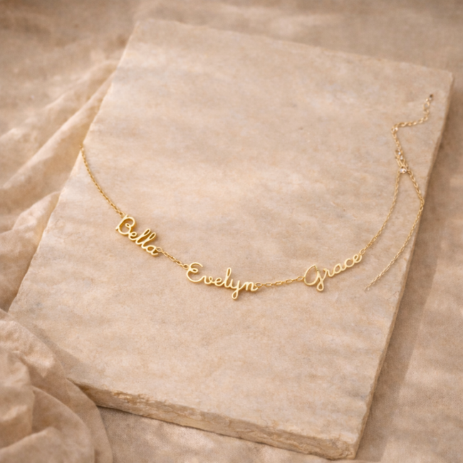 Unisex personalized jewelry necklace with engraved pendant by FJØRNA, showcasing a sleek, modern design on a silver chain.