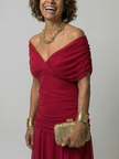 Elegant FJØRNA women's off-shoulder midi dress, bodycon style, showcasing a fitted silhouette and stylish neckline.