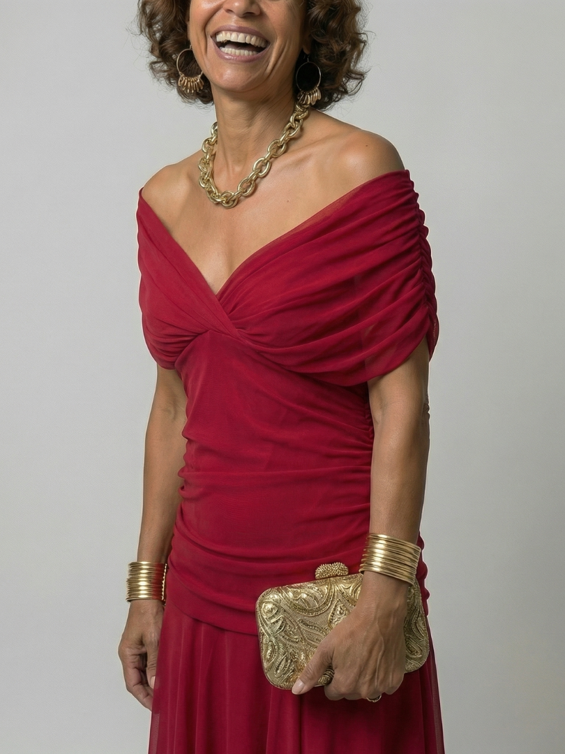 Elegant FJØRNA women's off-shoulder midi dress, bodycon style, showcasing a fitted silhouette and stylish neckline.