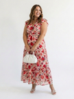 FJØRNA floral tiered summer midi dress for women with a flowy silhouette and vibrant floral pattern.