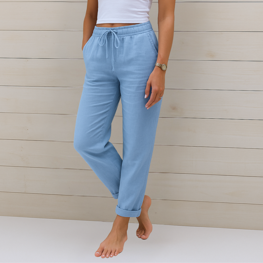FJØRNA Lori™ premium breathable pants with elastic waistband, lightweight fabric, and relaxed fit for comfortable everyday wear.