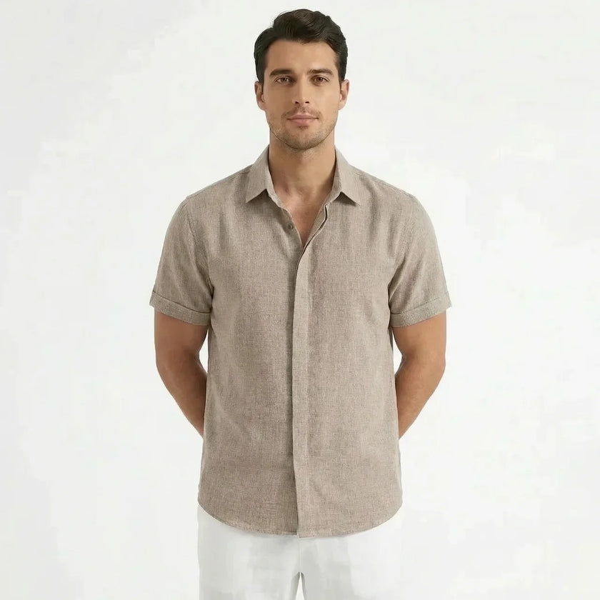 Men's cotton-linen short sleeve shirt by FJØRNA, shown in a relaxed fit with a classic collar and natural fabric texture.