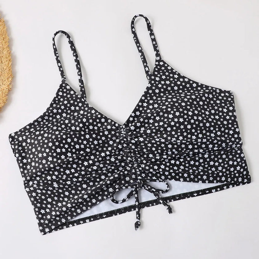 FJØRNA women's printed tankini set with flattering fit, featuring colorful patterned swim top and matching bottoms for beach or pool.
