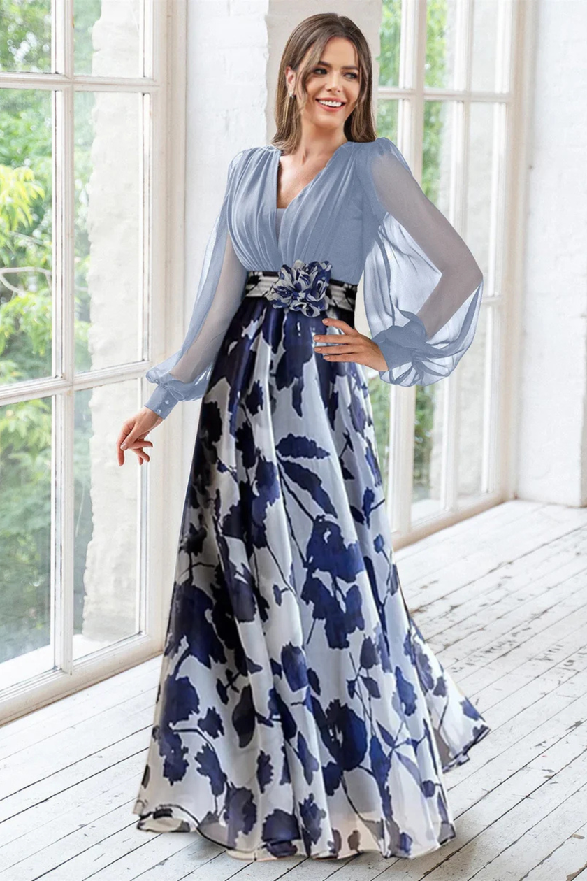 FJØRNA floral print maxi wedding guest dress with V-neck and balloon sleeves, featuring a elegant floral pattern for special occasions.