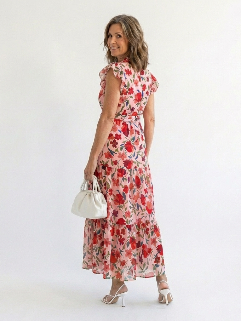FJØRNA women's floral tiered summer midi dress with sleeveless design and lightweight fabric, perfect for warm-weather wear.