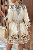 FJØRNA champagne printed V-neck lantern sleeve mini dress with waist tie, stylish and elegant for special occasions.