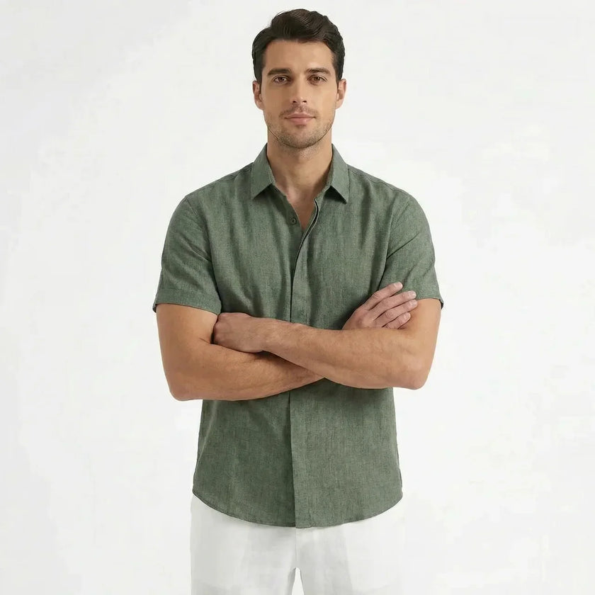 Men's cotton-linen short sleeve shirt by FJØRNA, shown in a relaxed fit with a button-up front and casual collar.