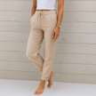 FJØRNA Lori™ premium breathable pants with elastic waistband, shown in a relaxed fit with soft fabric and adjustable waist.