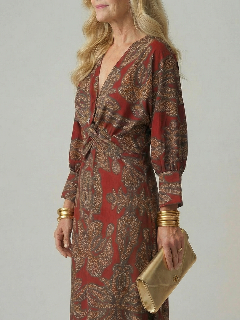 FJØRNA women's summer midi dress with long sleeves, wrap style, lightweight fabric, and elegant design for warm-weather wear.
