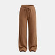 Women’s lightweight cotton wide leg trousers by FJØRNA, casual and comfortable pants with a relaxed fit and flowing silhouette.
