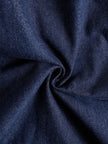 Dark blue denim FJØRNA sleeveless balloon jumpsuit with multiple front and side pockets, relaxed fit, and wide-leg design.