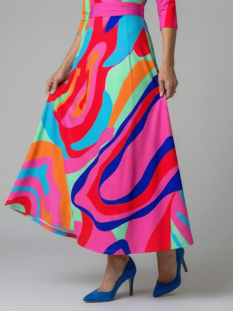 FJØRNA women's floral summer maxi dress with long sleeves, wrap style, flowing fabric, perfect for warm weather.