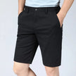 Men's FJØRNA shorts, casual pants with a relaxed fit, made from lightweight fabric, suitable for summer wear.