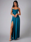 FJØRNA white maxi dress with spaghetti straps, flowing silhouette, perfect for evening wear or summer occasions.