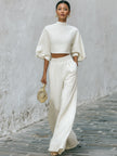 Cream textured lantern sleeve two-piece pants set from FJØRNA featuring stylish lantern sleeves and comfortable fit.