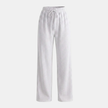 FJØRNA women's wide leg trousers with elastic waist and pleated design, showcasing a relaxed fit and stylish silhouette.