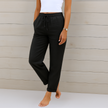 FJØRNA Lori™ premium breathable pants with elastic waistband, shown in a stylish, comfortable fit on a model.