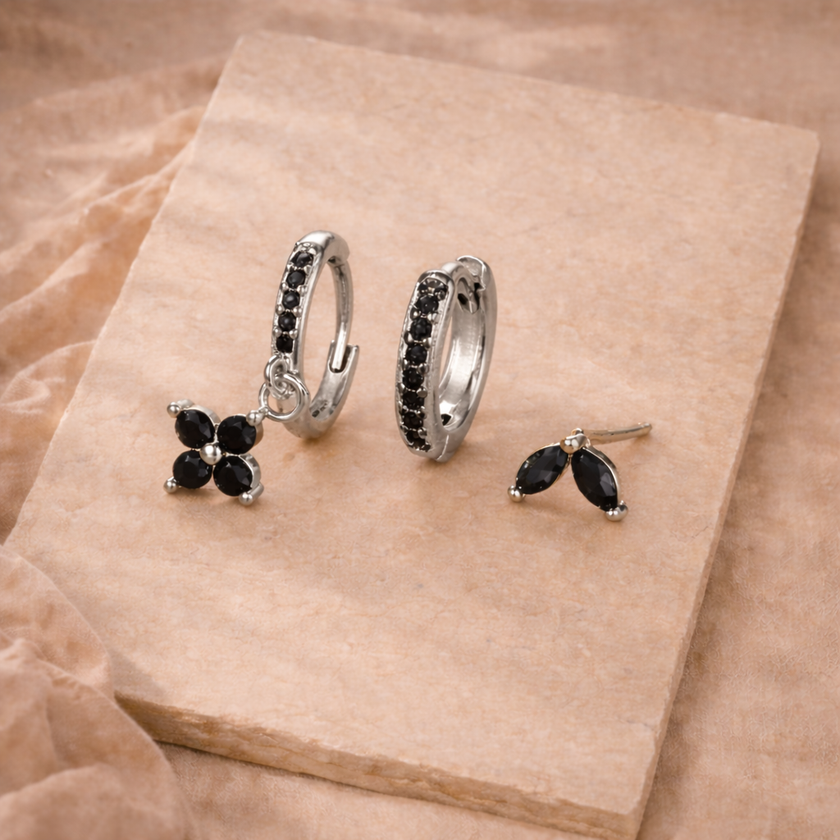 Unisex piercing set by FJØRNA featuring multiple jewelry accessories for women, displayed on a neutral background.