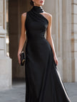 FJØRNA one-shoulder draped high-neck maxi dress in flowing fabric, stylish evening wear with elegant silhouette.
