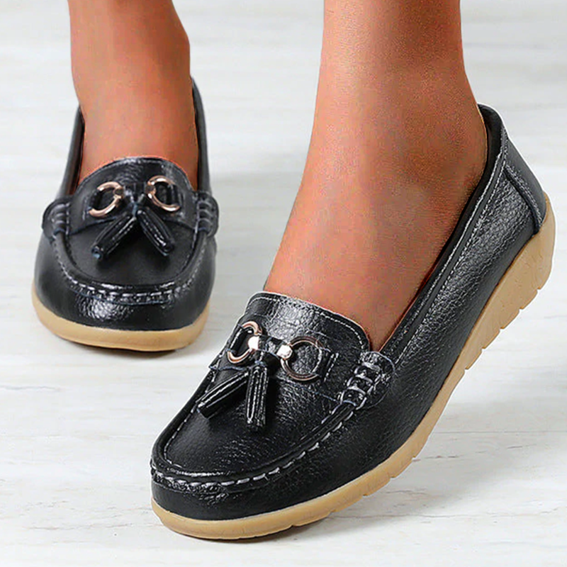 FJØRNA Comely Flex Orthopedic Loafer in black leather with supportive sole and sleek design, suitable for comfort and style.
