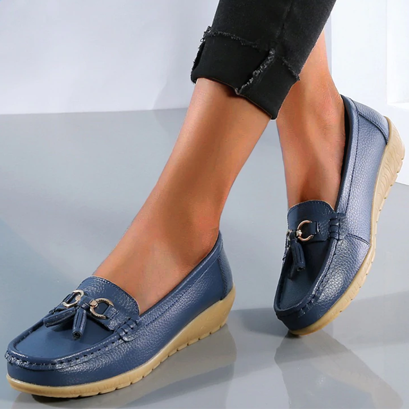 FJØRNA Comely Flex Orthopedic Loafer showing black leather upper, cushioned insole, and slip-on design for comfortable everyday wear.
