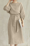 Flowy Bardot midi dress for women by FJØRNA, elegant and stylish, featuring a flowing fabric and off-shoulder design.